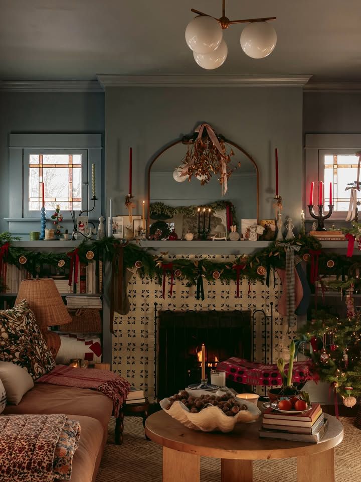 Whimsical Christmas decor ideas with vintage ornaments, greenery and warm lights